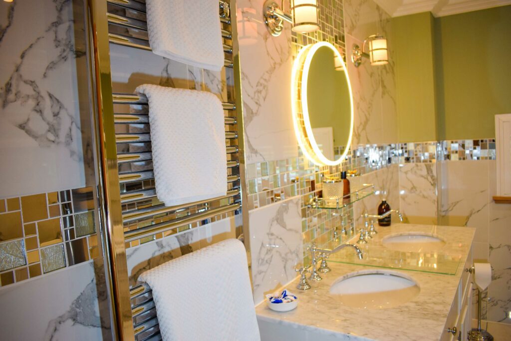 The marble tiled bathroom in our Skyfall Hideaway ads to the opulence of the accommodation