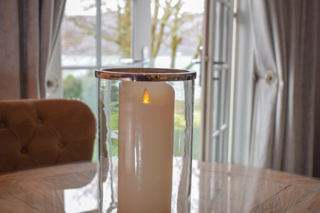 Our Skyfall Luxury Hideaway's lounge has a Juliette balcony overlooking the loch