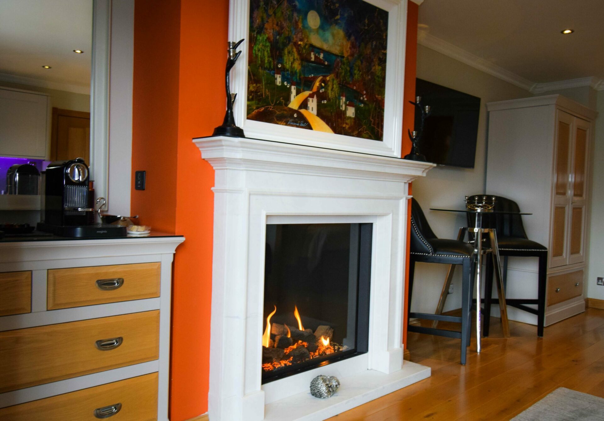 The fireplace and dining area in our Allanbreck Luxury Hideaway, Glencoe