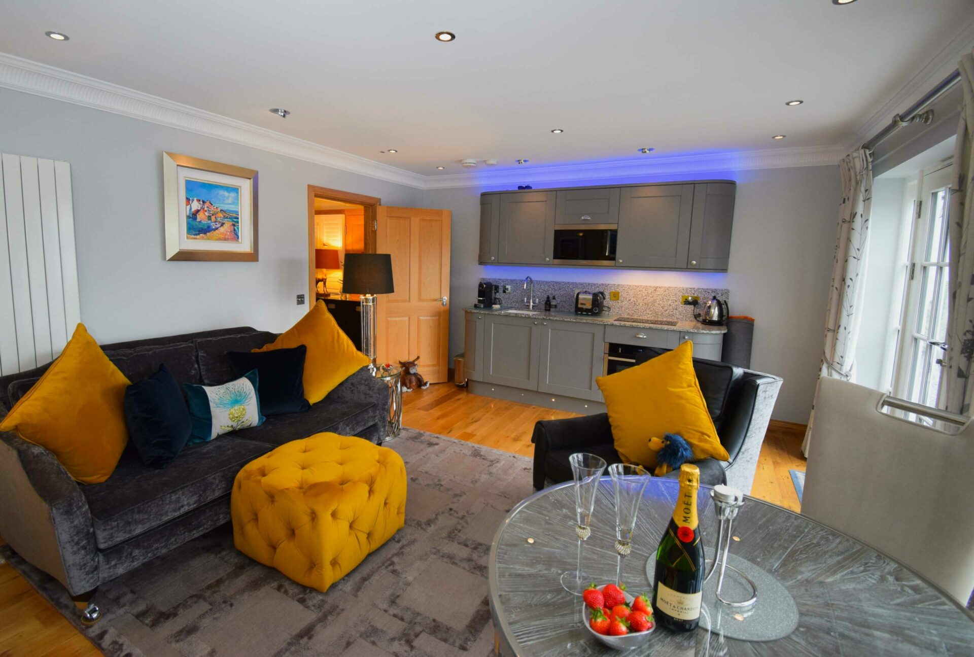 The open plan living area in our Outlander Luxury Hideaway accommodation near Glencoe