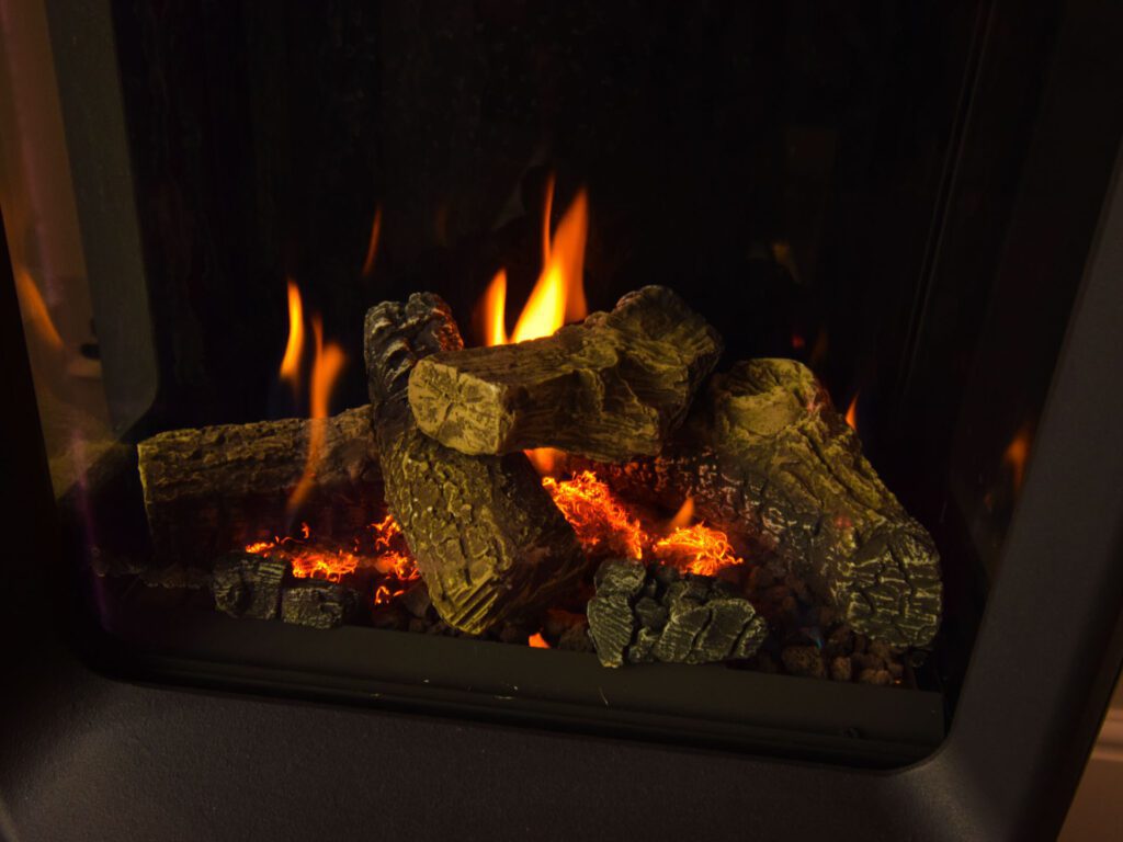 The flame effect fire in the lounge at Little Fox Lodge Hideaway ensures cosy evenings set for romance.