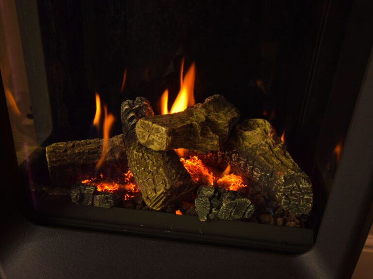 The flame effect fire in the lounge at Little Fox Lodge Hideaway ensures cosy evenings set for romance.